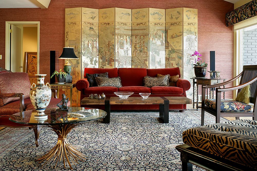 Stunning modern Asian living room with a red sofa and a gorgeous screen