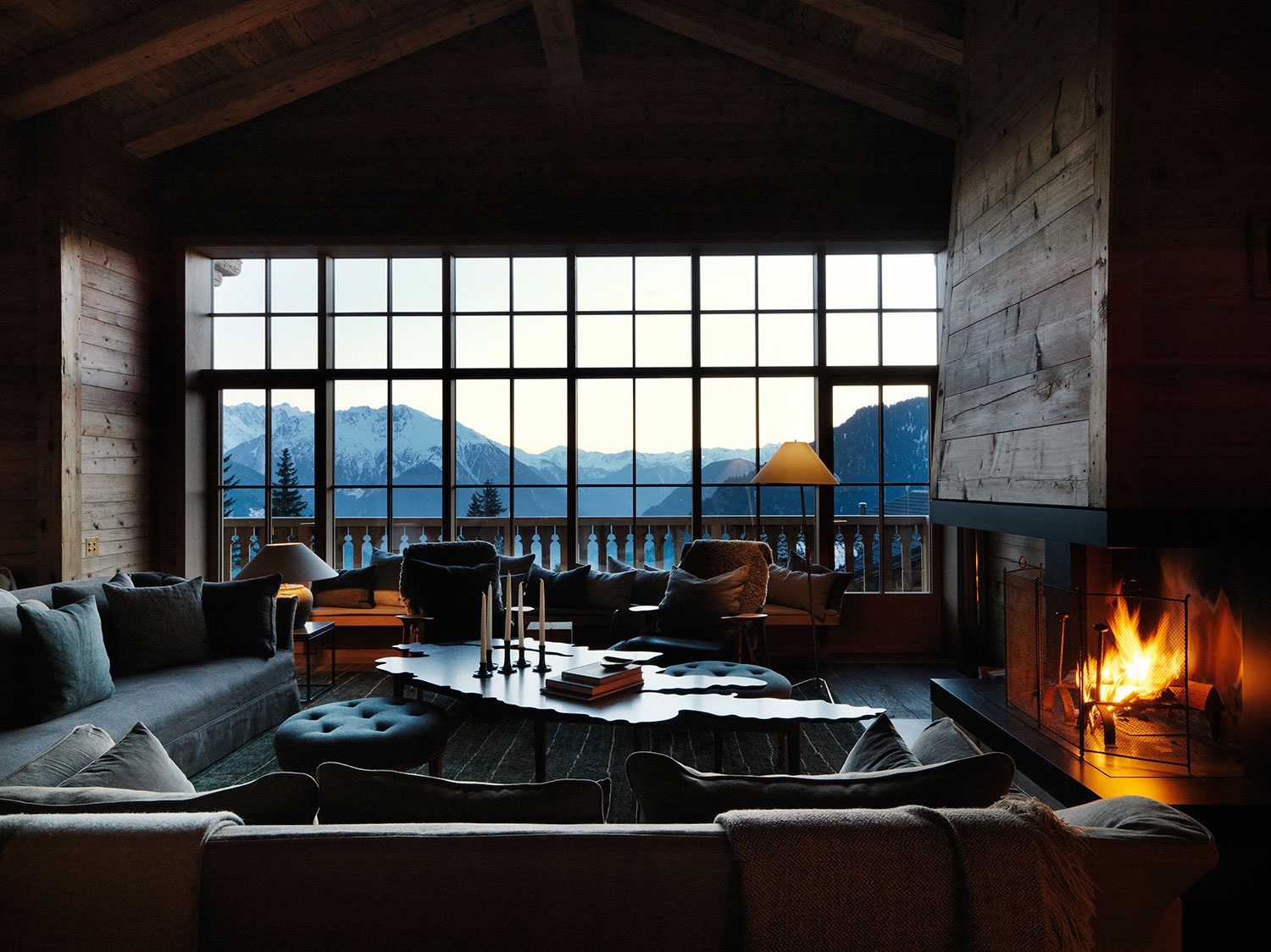 Using natural materials, layers of textile and sumptuous furniture, Ilse Crawford's Studioilse created this cosy chalet deep in the Swiss Alps. Image courtesy of Studioilse.