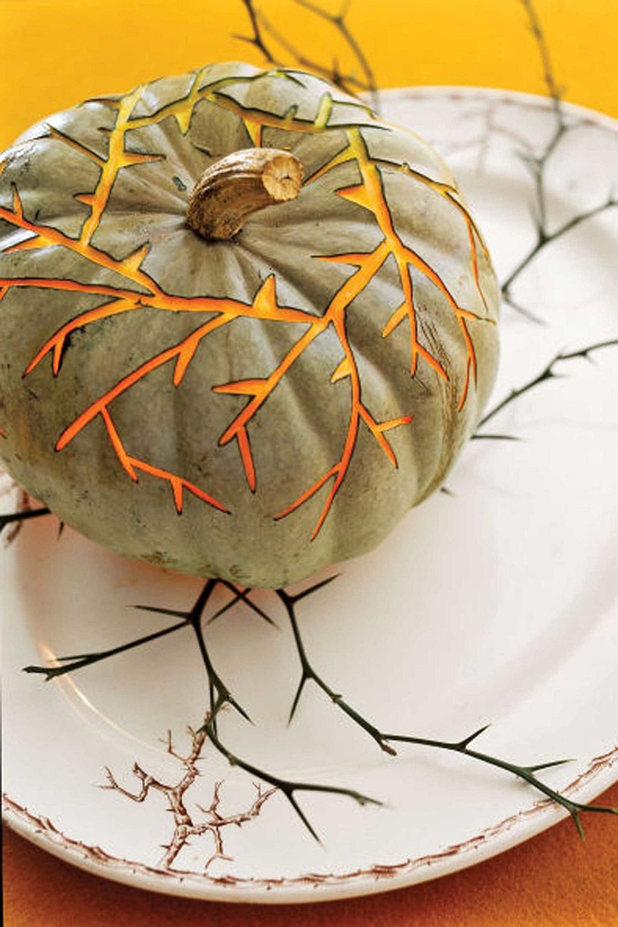 Thorny vines pumpkin can also acts as a stunning centerpiece on your Halloween dining table