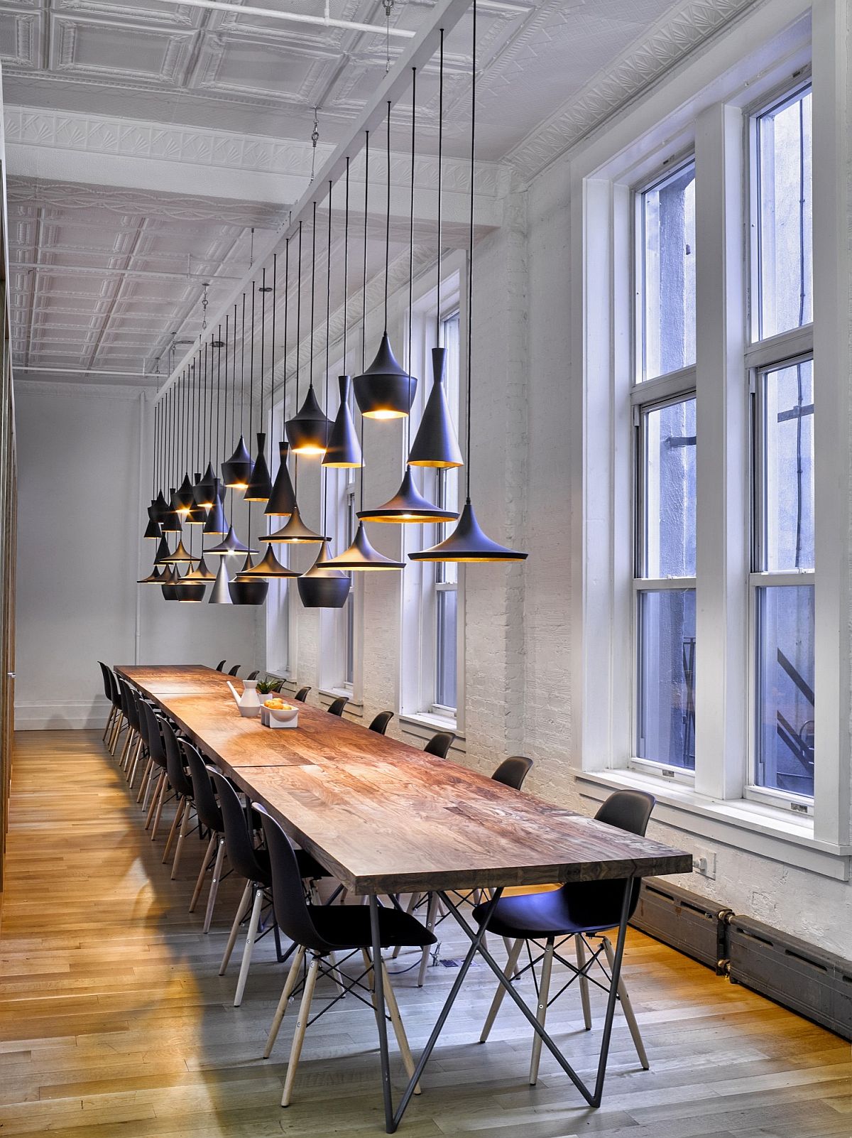 Tom Dixon pendants fit in with the cool style of the smart office