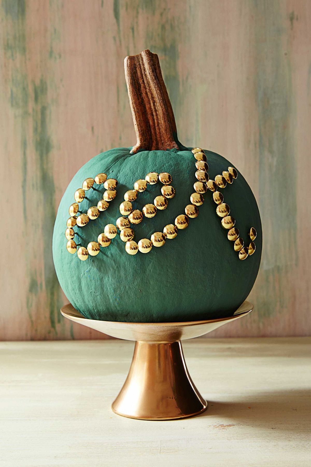 Touch of tacky color and pattern for the Halloween pumpkin [From: Annies Loan]