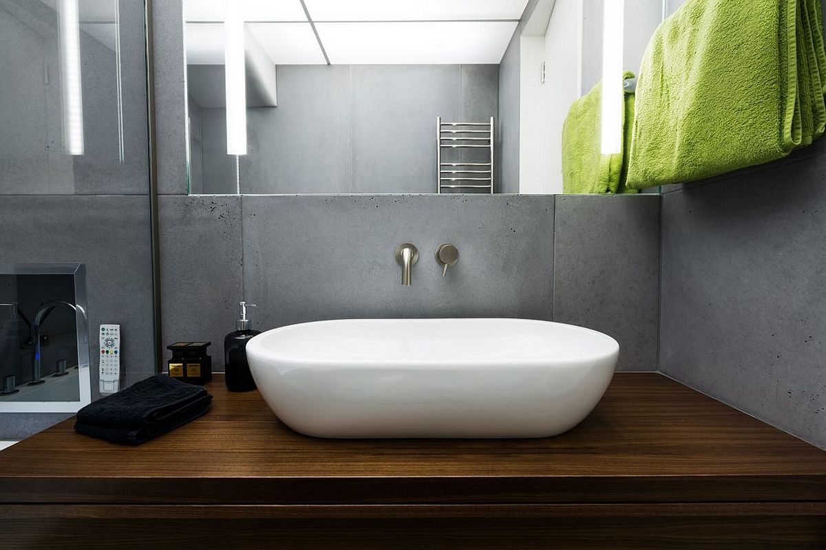 Walnut oak vanity inisde the stylish bathroom