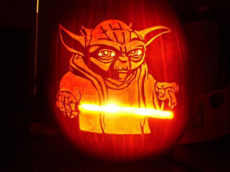 Yoda pumpkin stencil with light saber is a showstopper! [From: instructables]