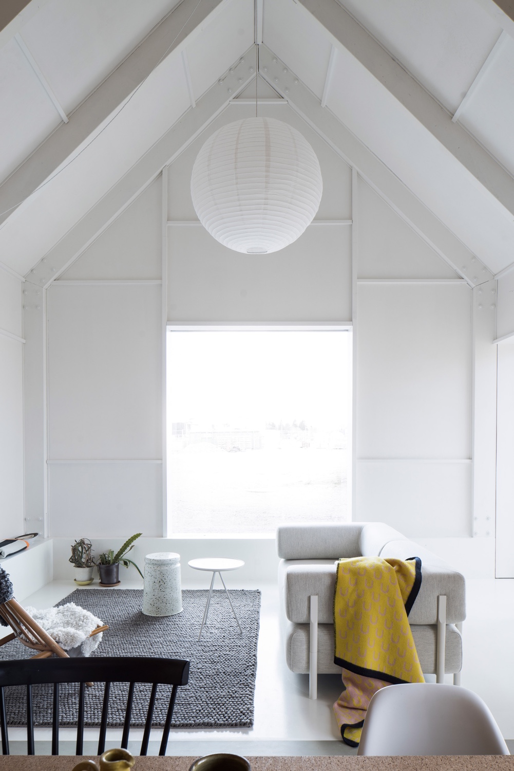 A cosy corner in a home designed by Björn Förstberg, co-founder of architectural studio Förstberg Ling. Photo by Markus Linderoth via Dezeen. 