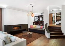 Breezy-and-modern-living-room-with-smart-fireplace-and-colorful-lighting-217x155