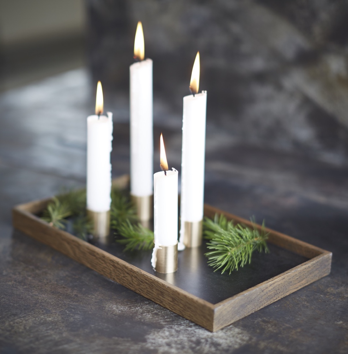 Candle Tray De Luxe with a black oiled frame and magnetic candle holders made from solid brass.