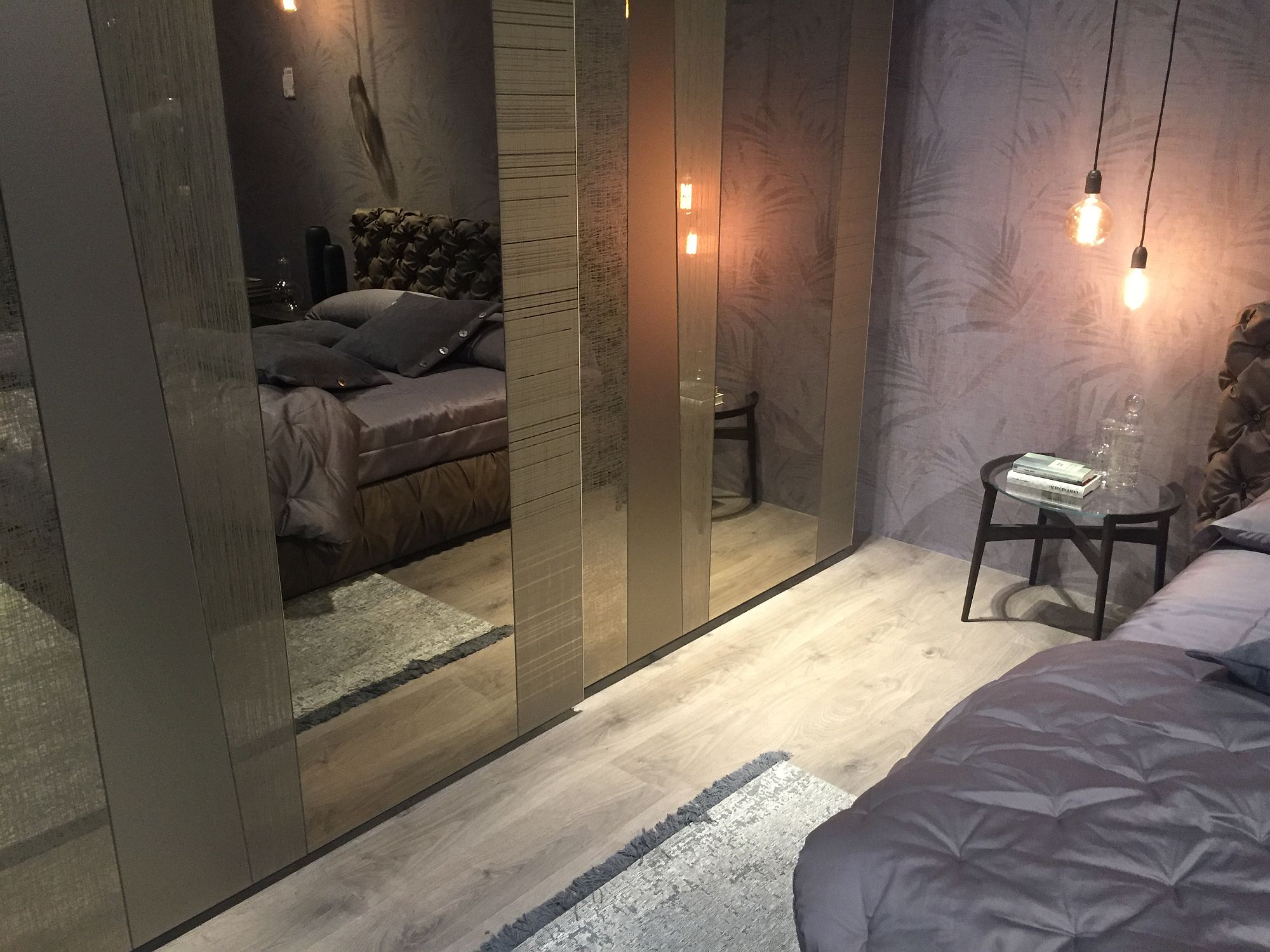 Closer look at the trendy mirrored bedroom closets