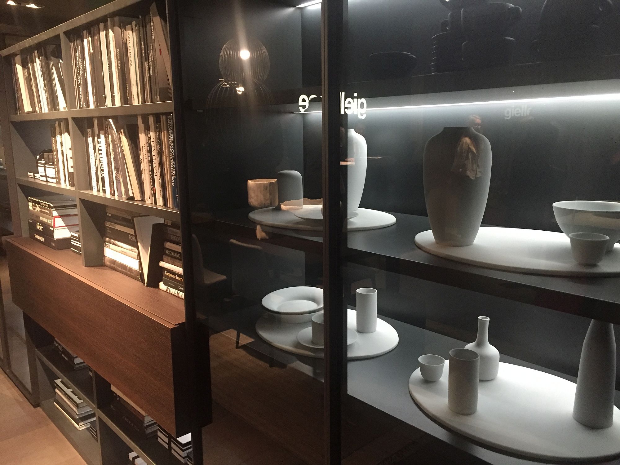 Combine your fancy china and cool art collection with a wall of books!