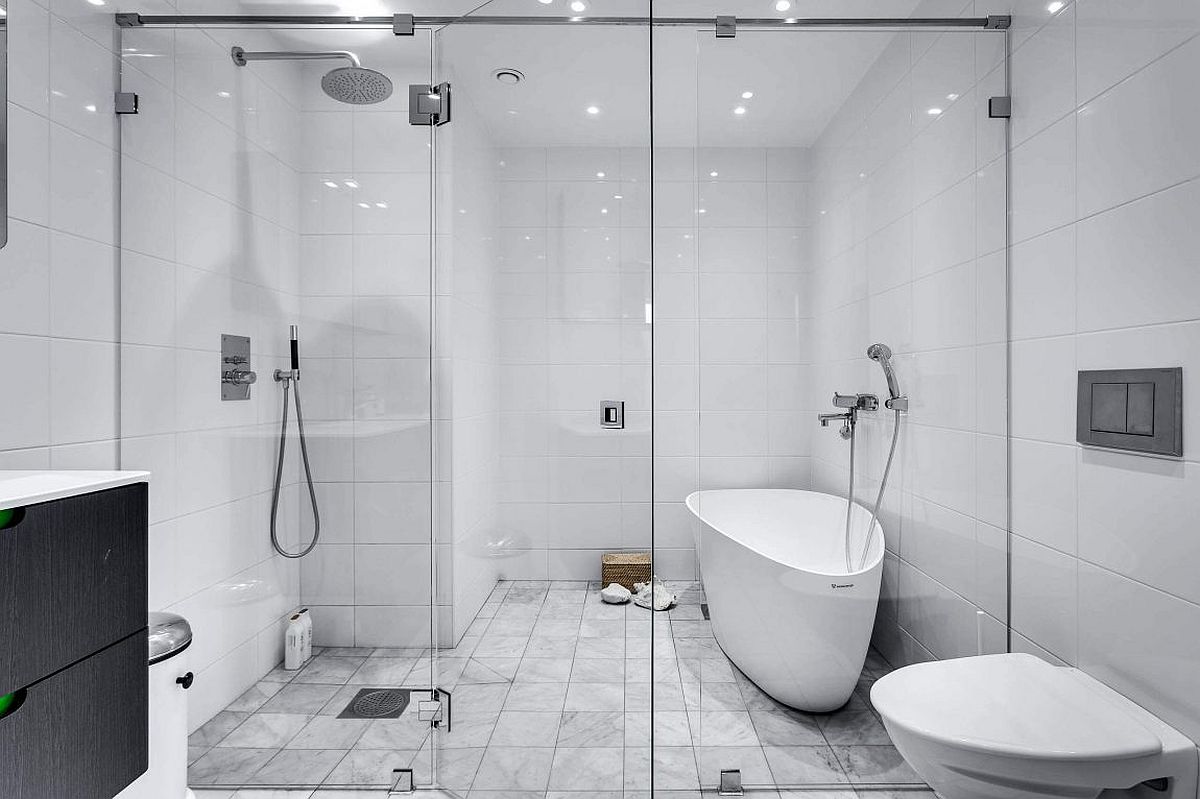 Contemporary bathroom in white with glass shower area