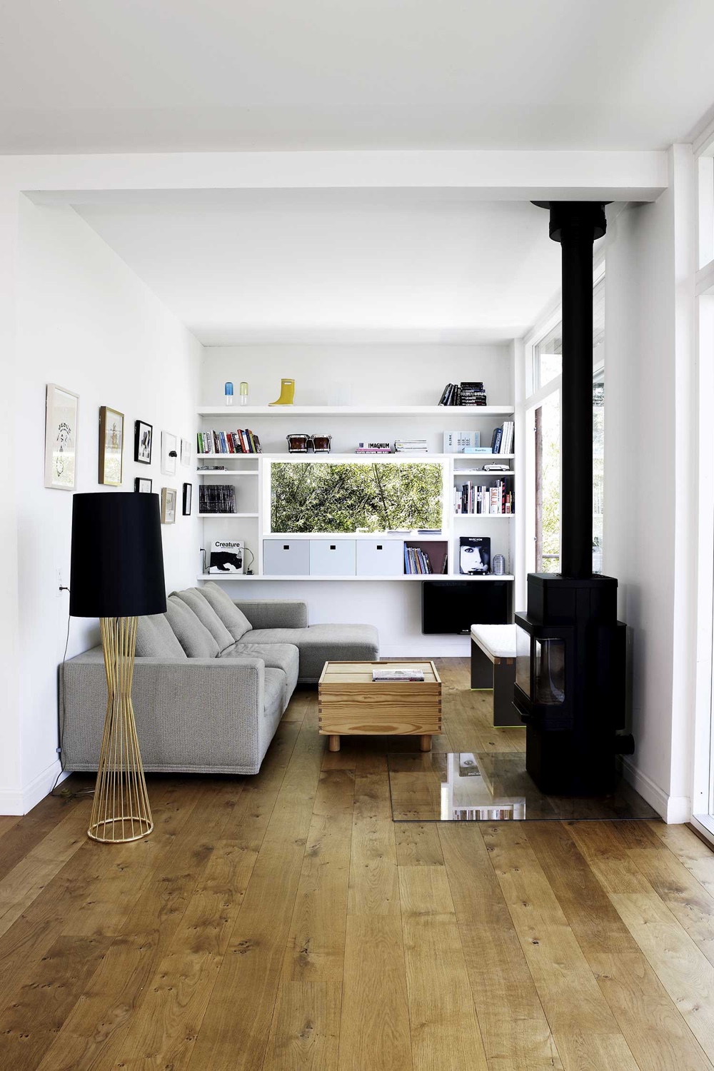 A cosy reading nook in a house in Copenhagen by Søren Rose Studio. Image via Søren Rose Studio.