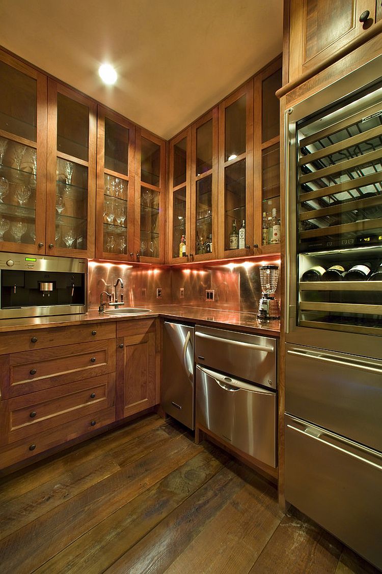 Corner home bar in the kitchen with copper backsplash [From: Webber + Studio, Architects/ Paul Finkel Photography]