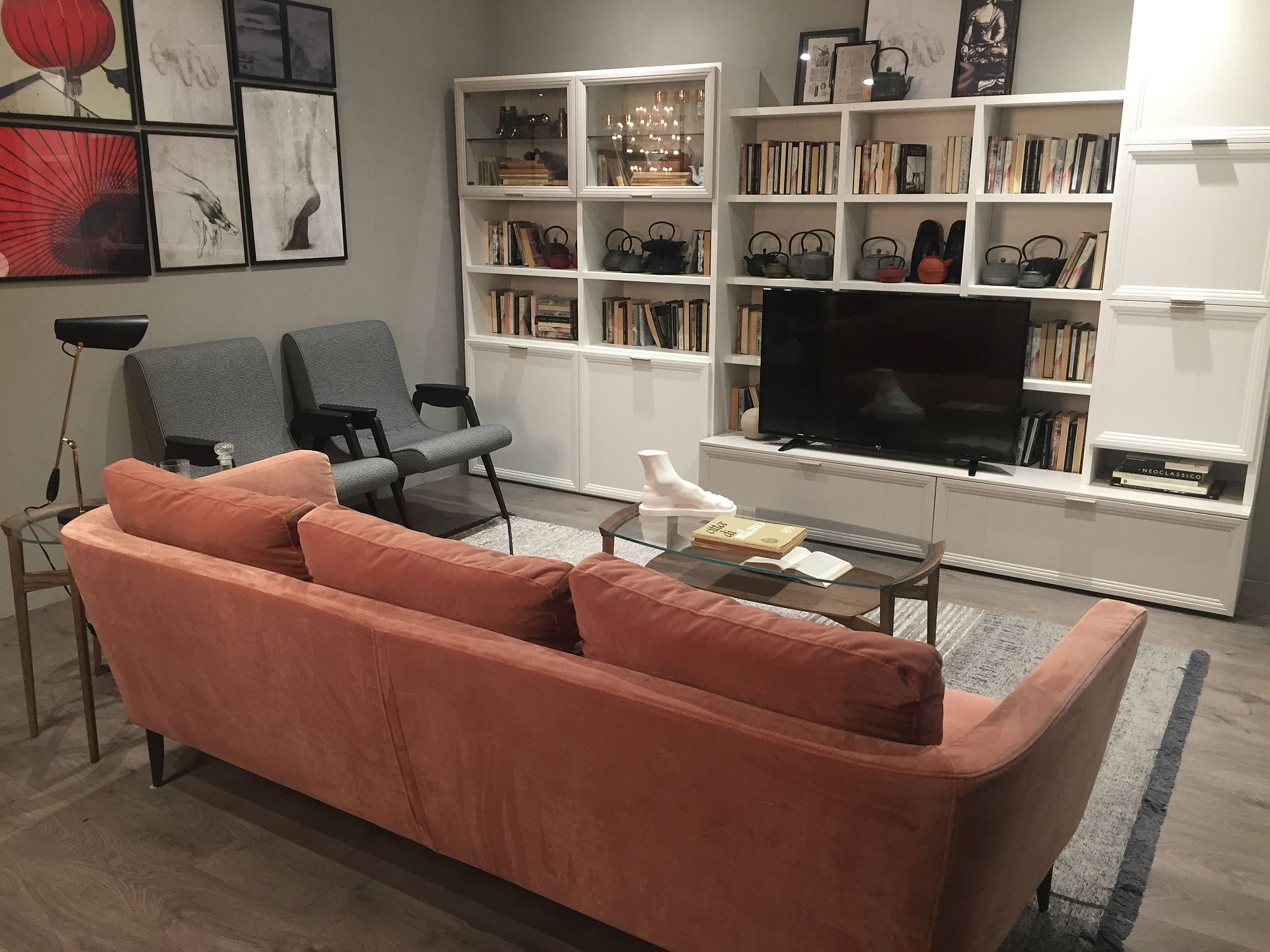 Couch in muted pink is perfect for the feminine living room