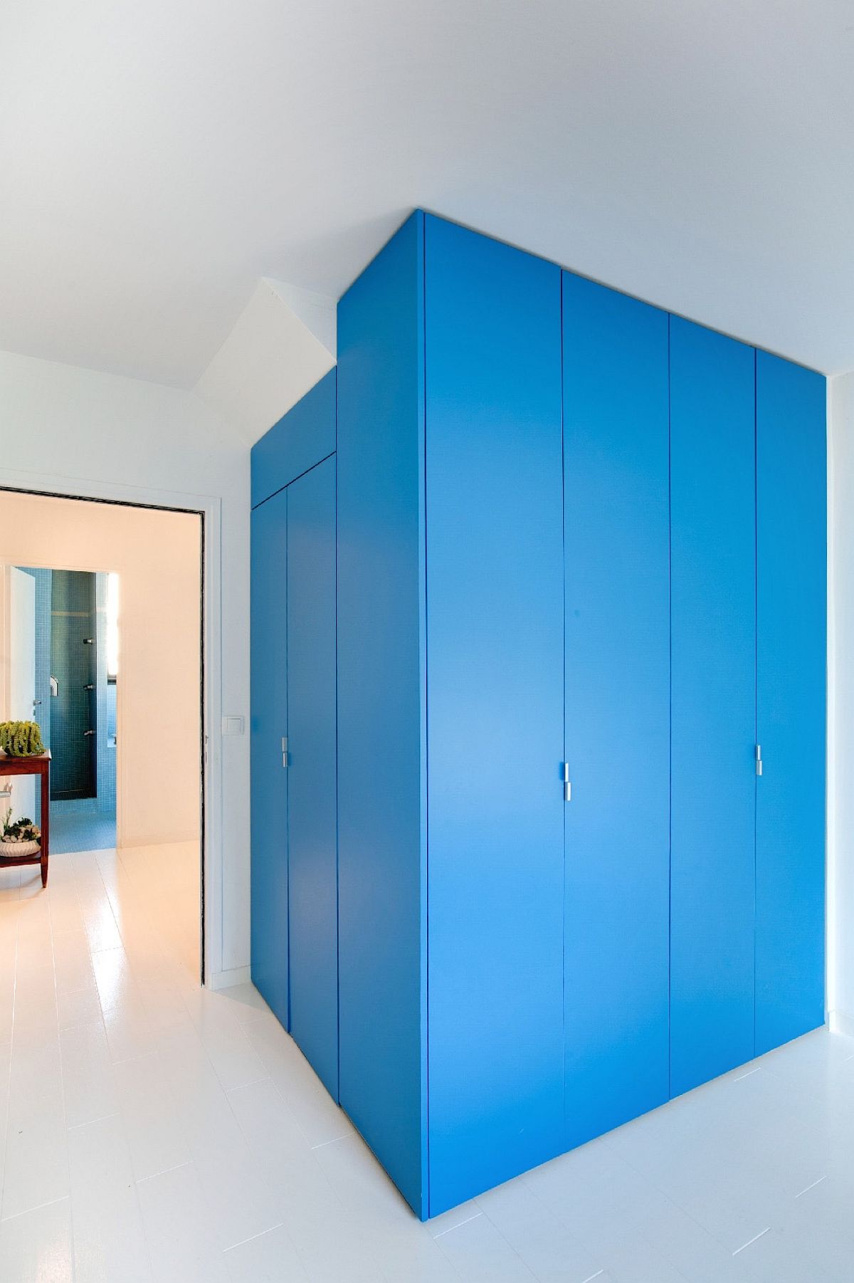 Custom units and smart rooms create a colorful and classy interior
