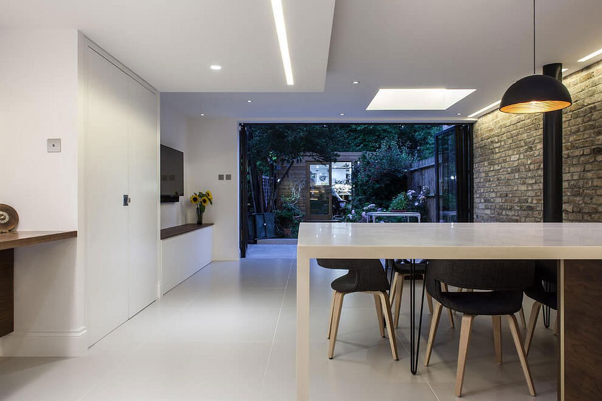 Elegant modern extension in white of classic London home