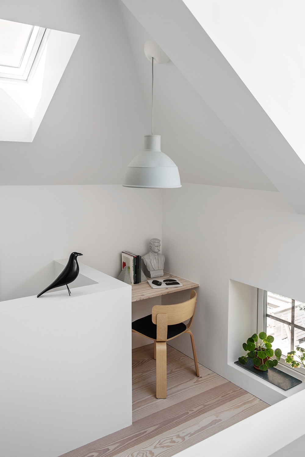 A cosy reading corner in a Stockholm residence designed by Malmö-based architectural studio Förstberg Ling. Photo by Erik Lefvander via Dezeen.