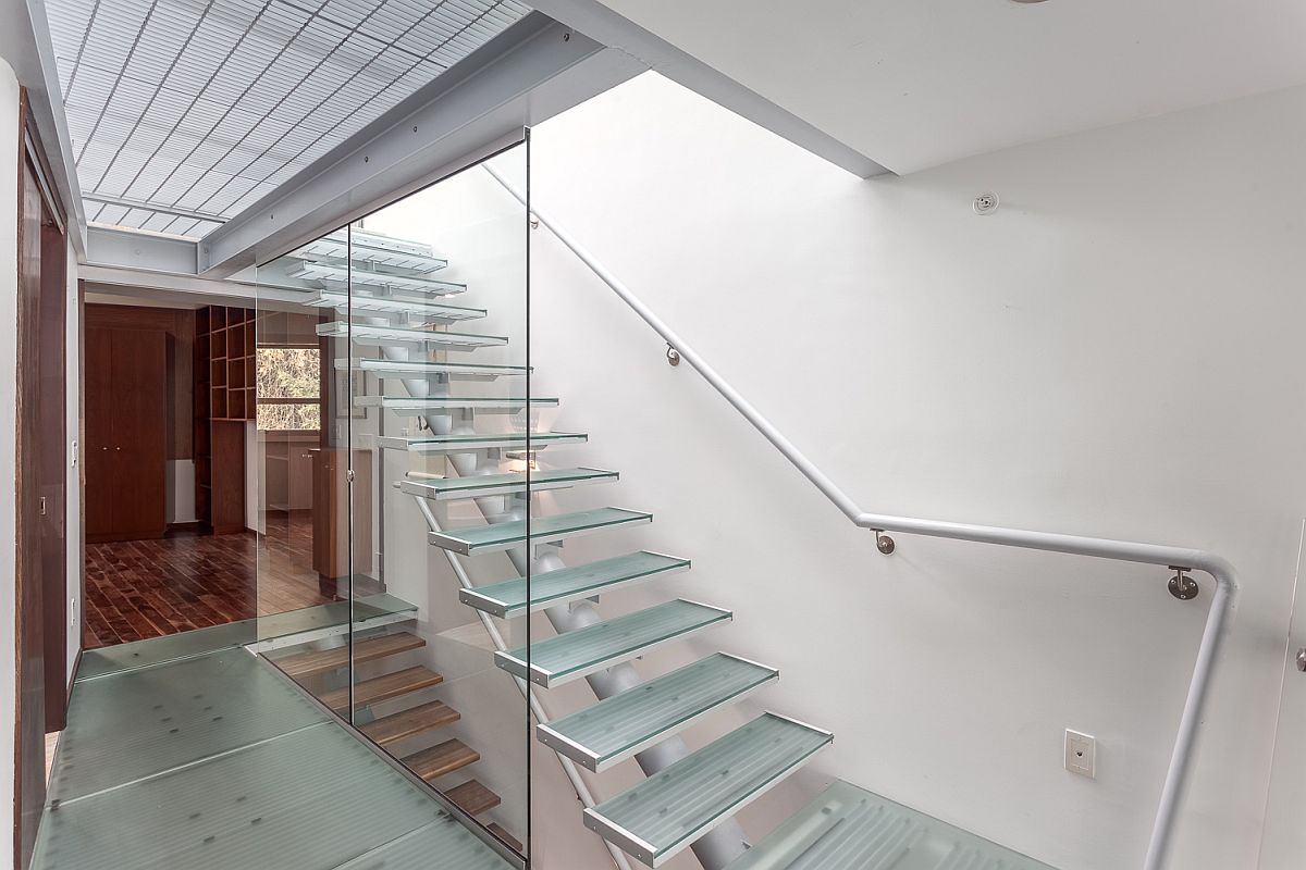 Glass flooring, stairs and skylights bring in ample natural light