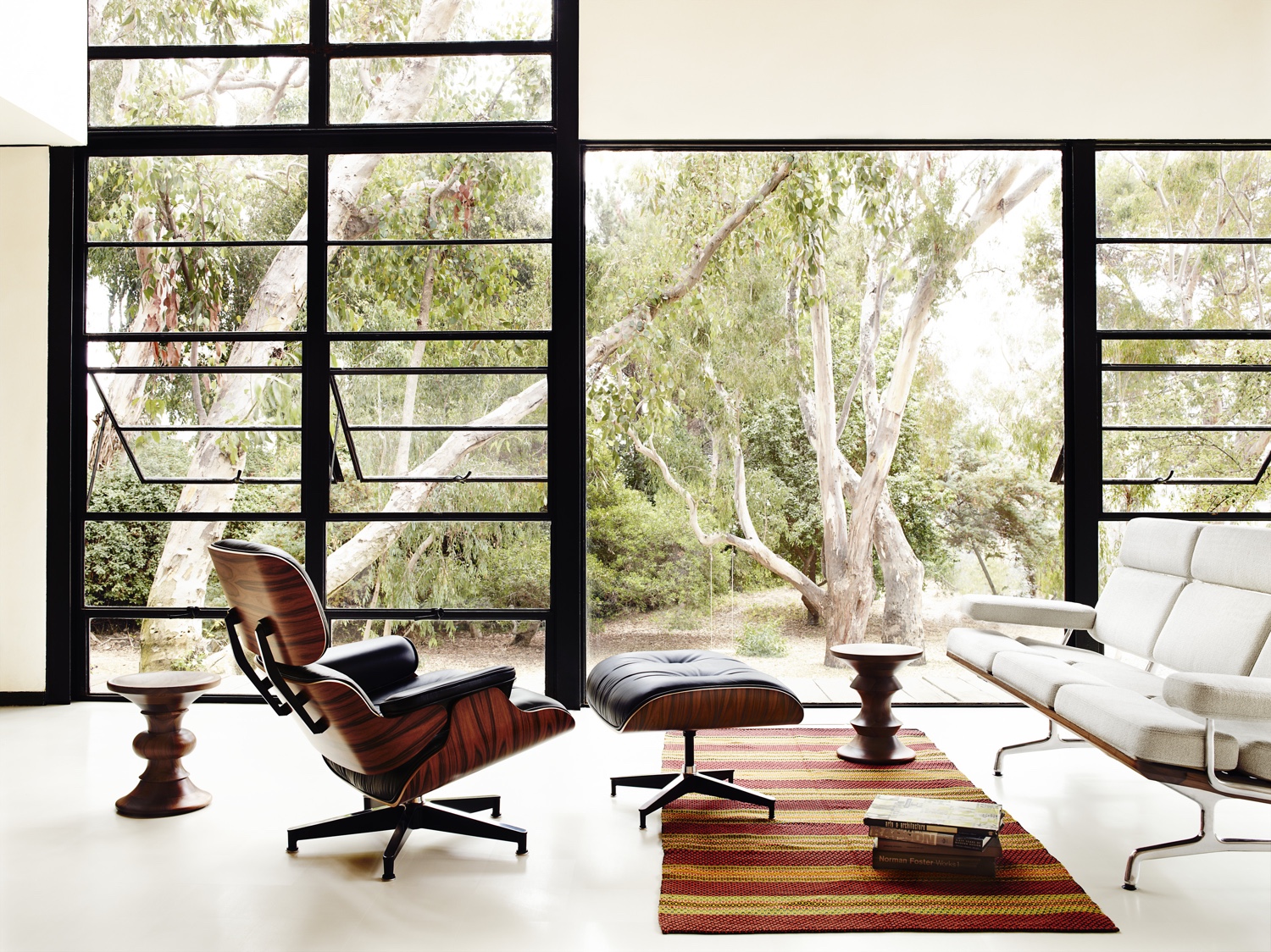 Classic Eames Lounge Chair and Ottoman in black leather.