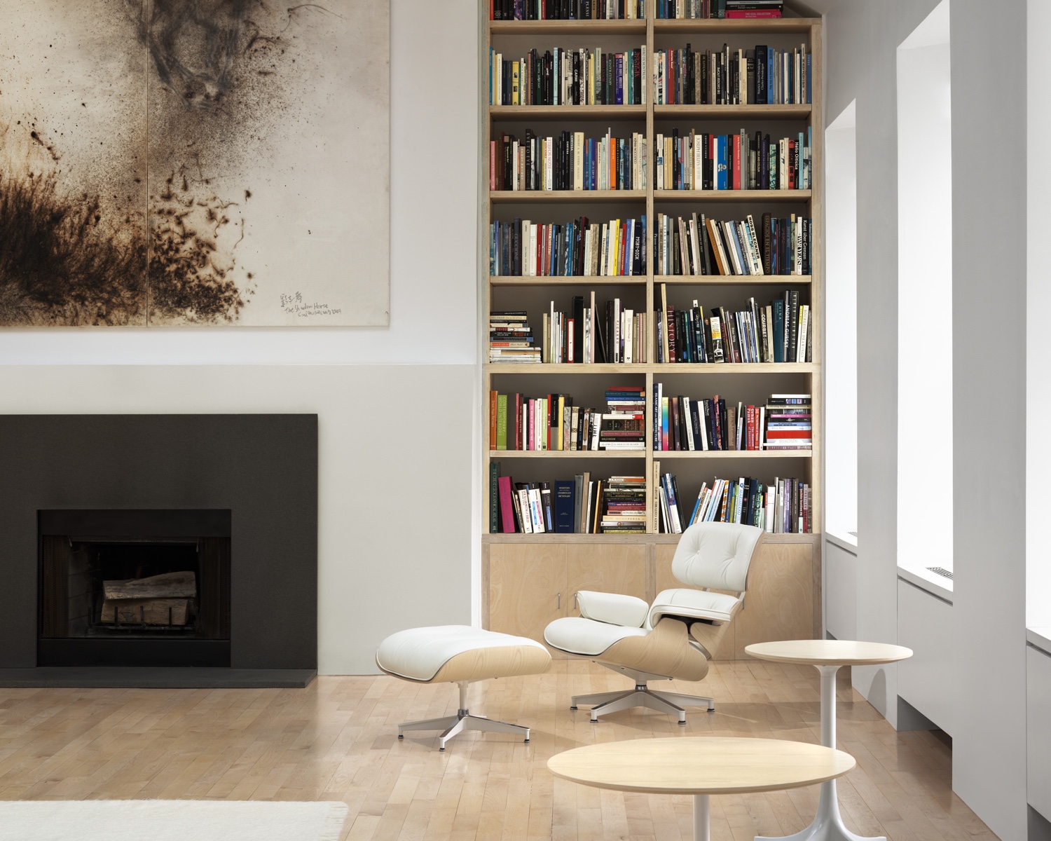 Eames Lounge Chair and Ottoman in white ash and pearl leather.