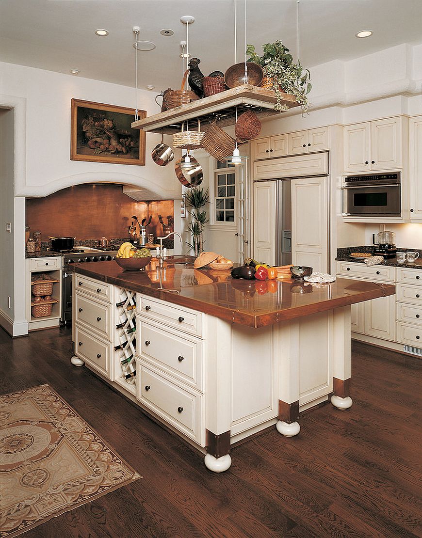 Modern Traditional Kitchen With A Shiny Copper Backsplash That Complements The Copper Worktop Of The Island 