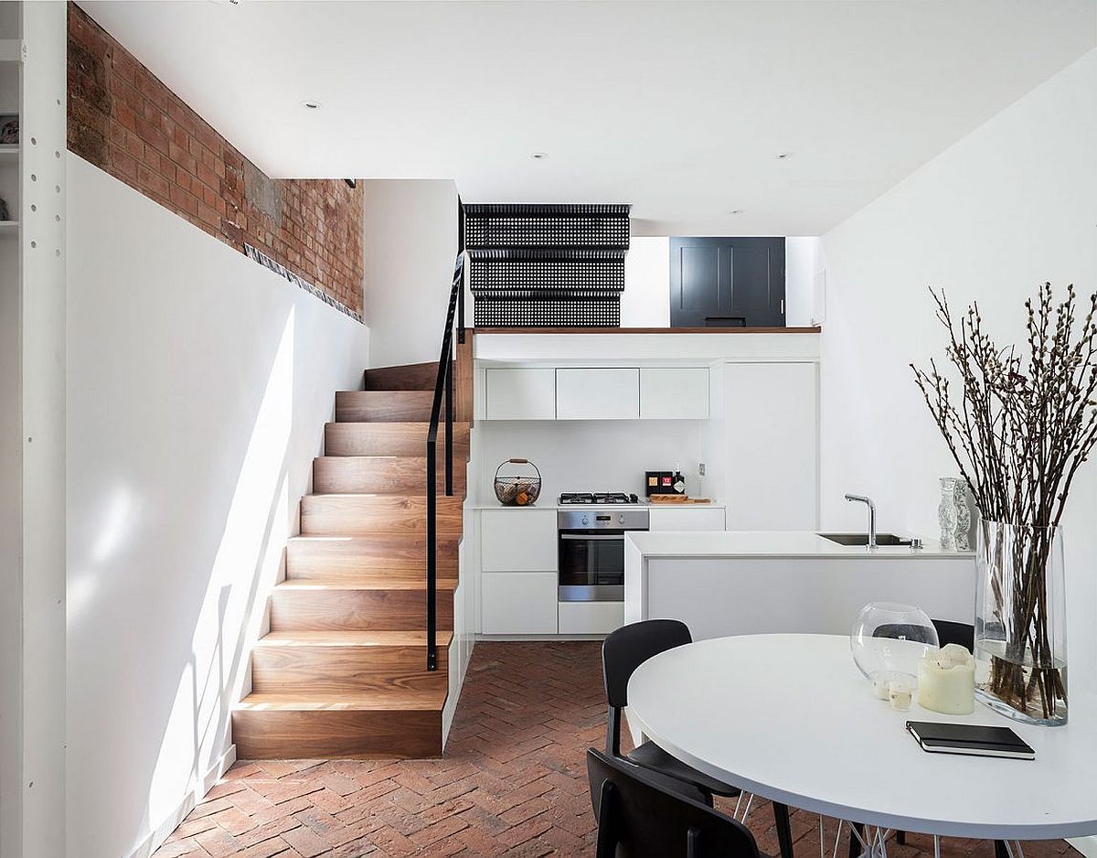 Open plan kitchen and dining space on the basement level of the London home