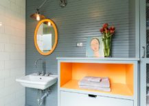 Orange gives cheerful spunk to the contemporary bathroom 217x155 Trendy Bathrooms that Combine Gray and Color in Sensational Style!