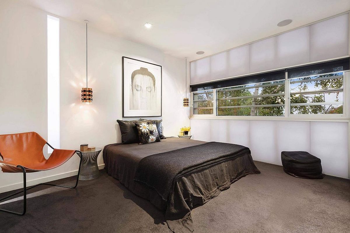 Platner side table next to the bedroom in black and white