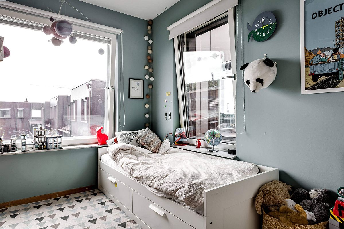 Scandinavian style kids' bedroom in gray with corner bed