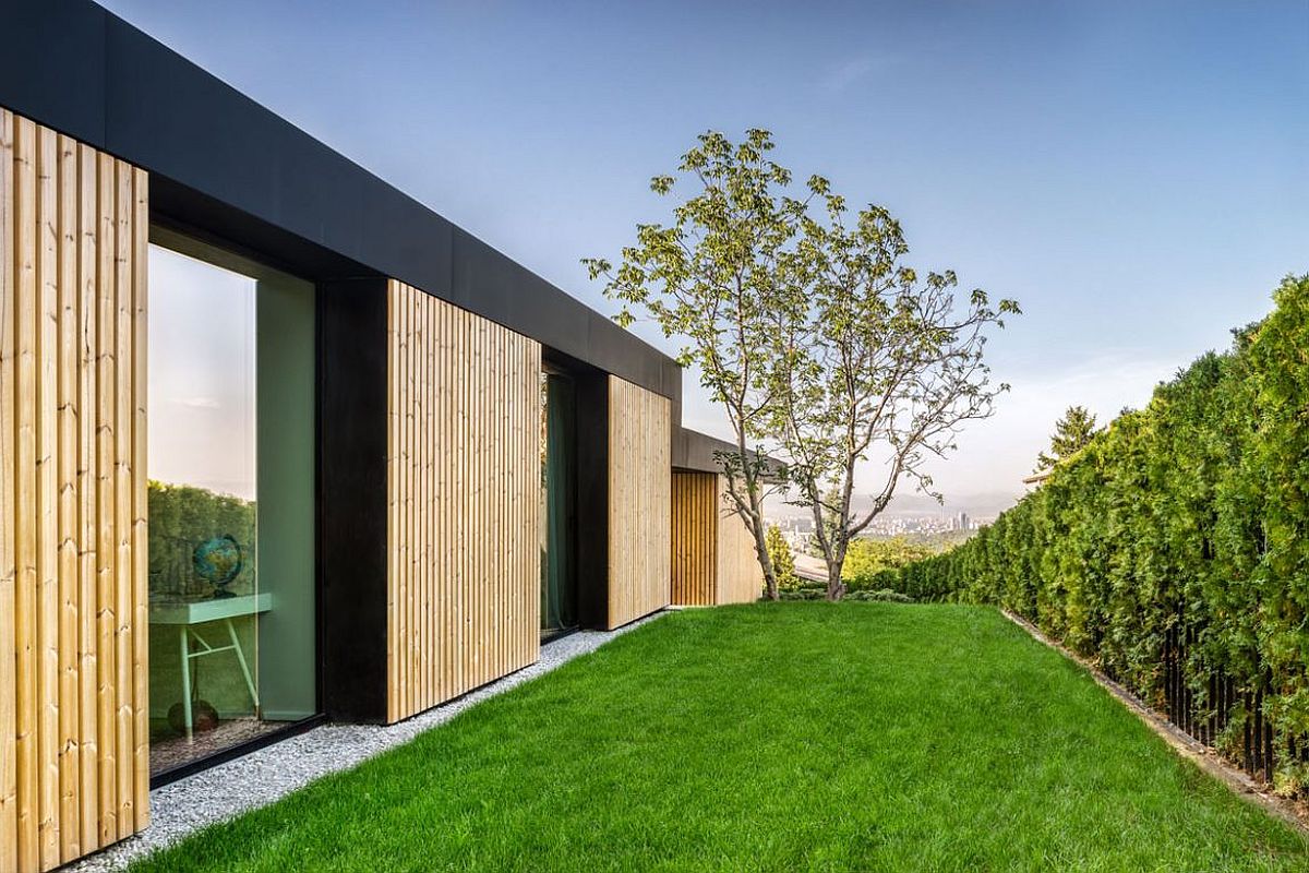 Sloped site and green garden of the stylish modern home in Sofia