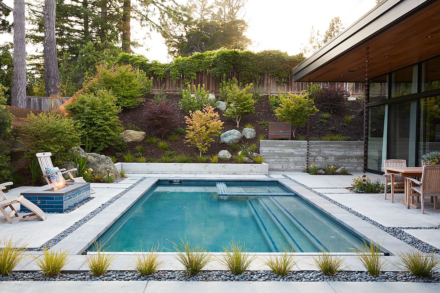 Small backyard pool idea with a smart landscape around it