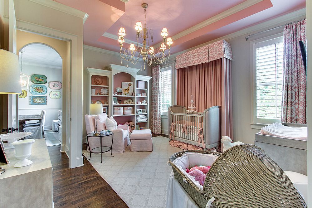 Spacious traditional nursery in gray and pink with play area