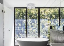Standalone-bathtub-and-chandelier-for-the-contemporary-bath-217x155
