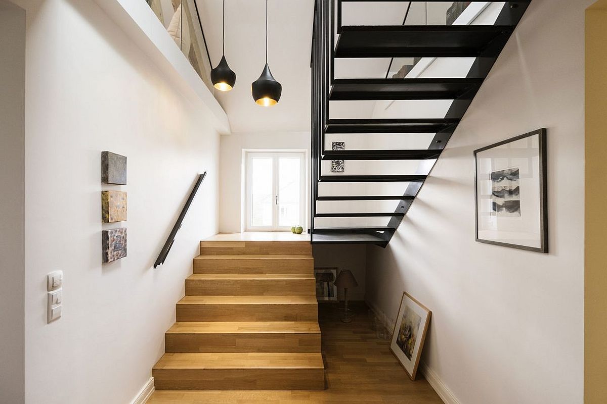 Tom Dixon pendant lights add style to the stairway