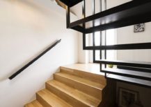 Wood-and-steel-staircase-connects-the-various-levels-of-the-house-217x155