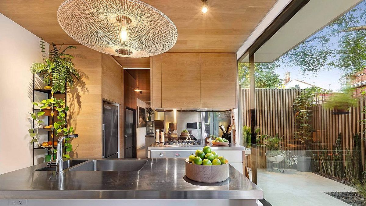 Wooden cabinets and kitchen shelves of the Aussie home