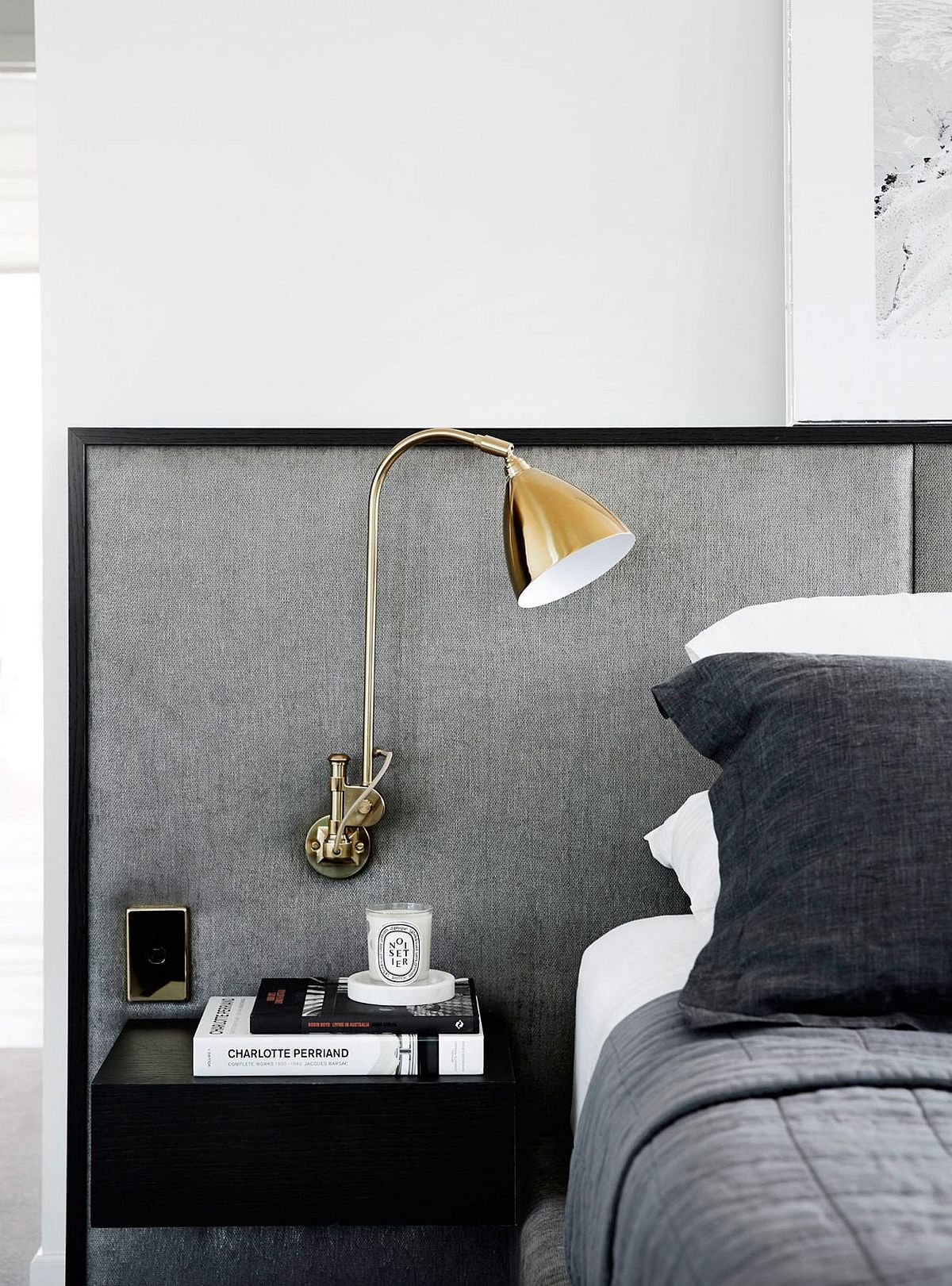 Bedside lamp in gold for the modern bedroom in gray and white