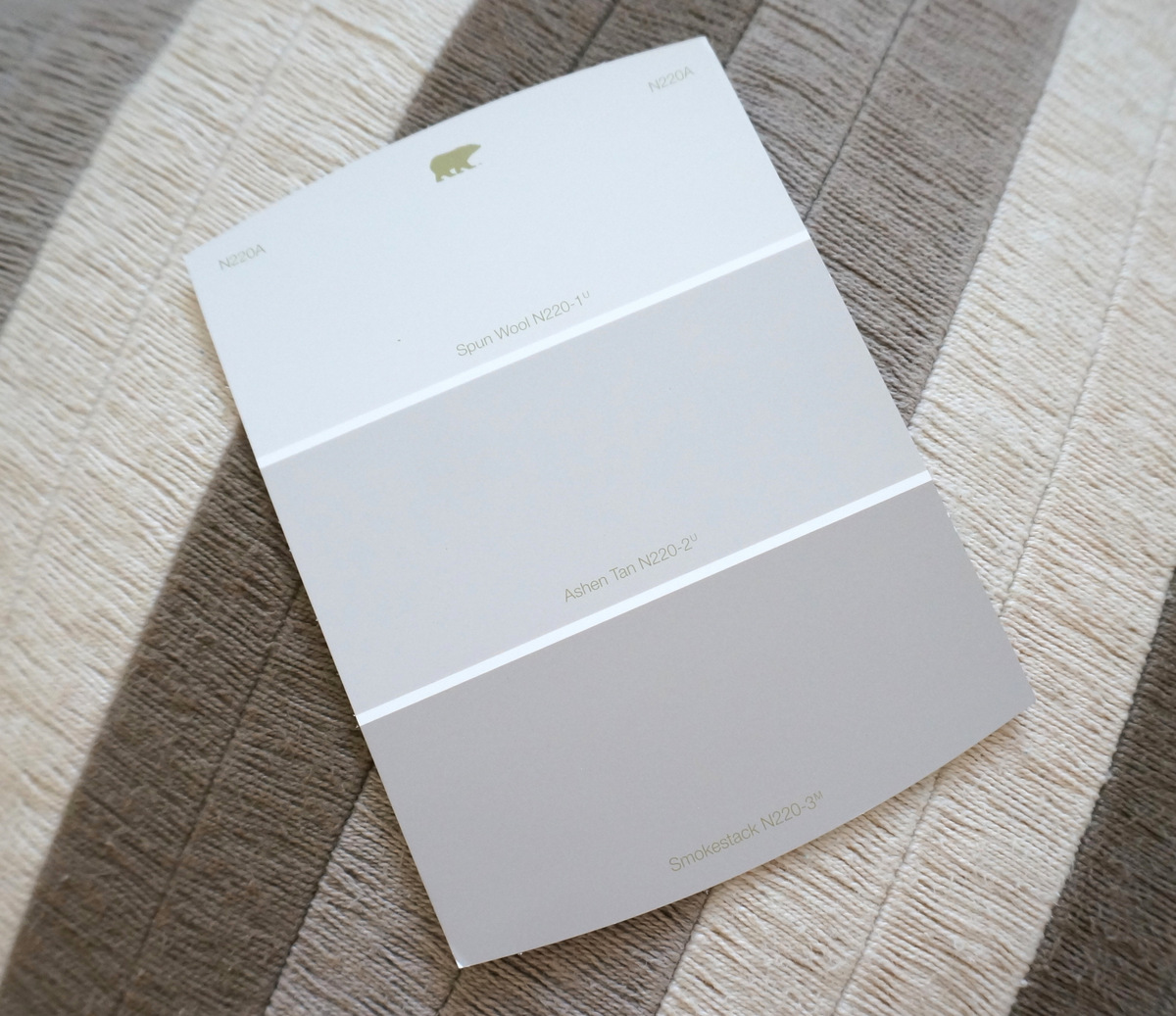 A beige paint sample card