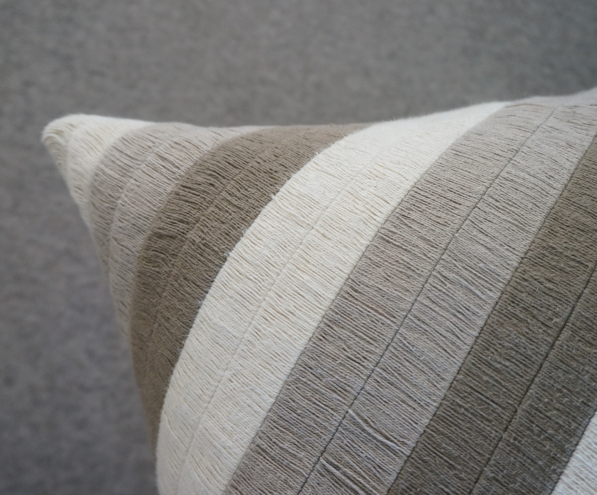 Beige striped pillow from Crate & Barrel