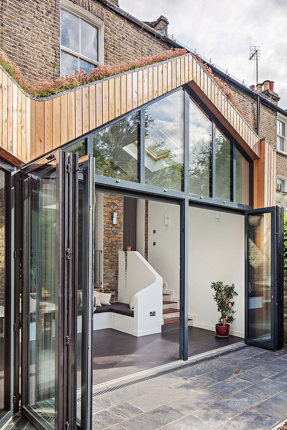 Bench seating offers a stylish social zone inside the new extension