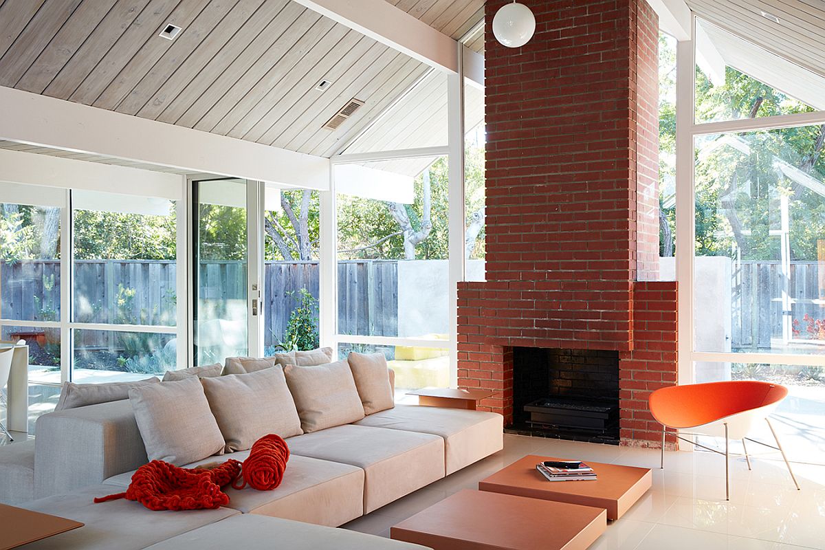 Classic brick fireplace inside the remodeled Eichler home