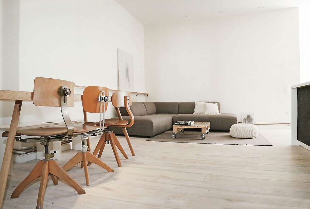 Coffee table on wheels at the heart of the living room of Berlin home