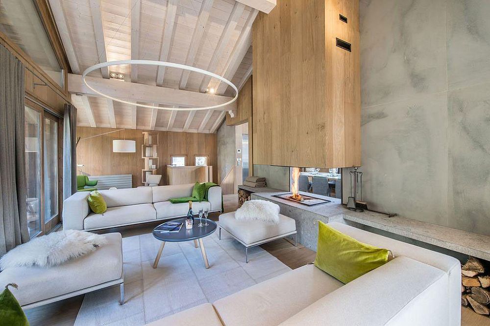 Contemporary fireplace at the heart of the modern living room of French Chalet