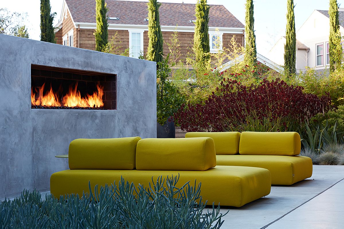 Contemporary outdoor hangout with bright yellow seating