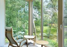 Corner-glass-walls-open-up-the-interior-to-the-forest-outside-217x155