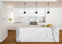 Dark-pendant-lights-offer-visual-contrast-in-the-white-kitchen-filled-with-marble-goodness-217x155