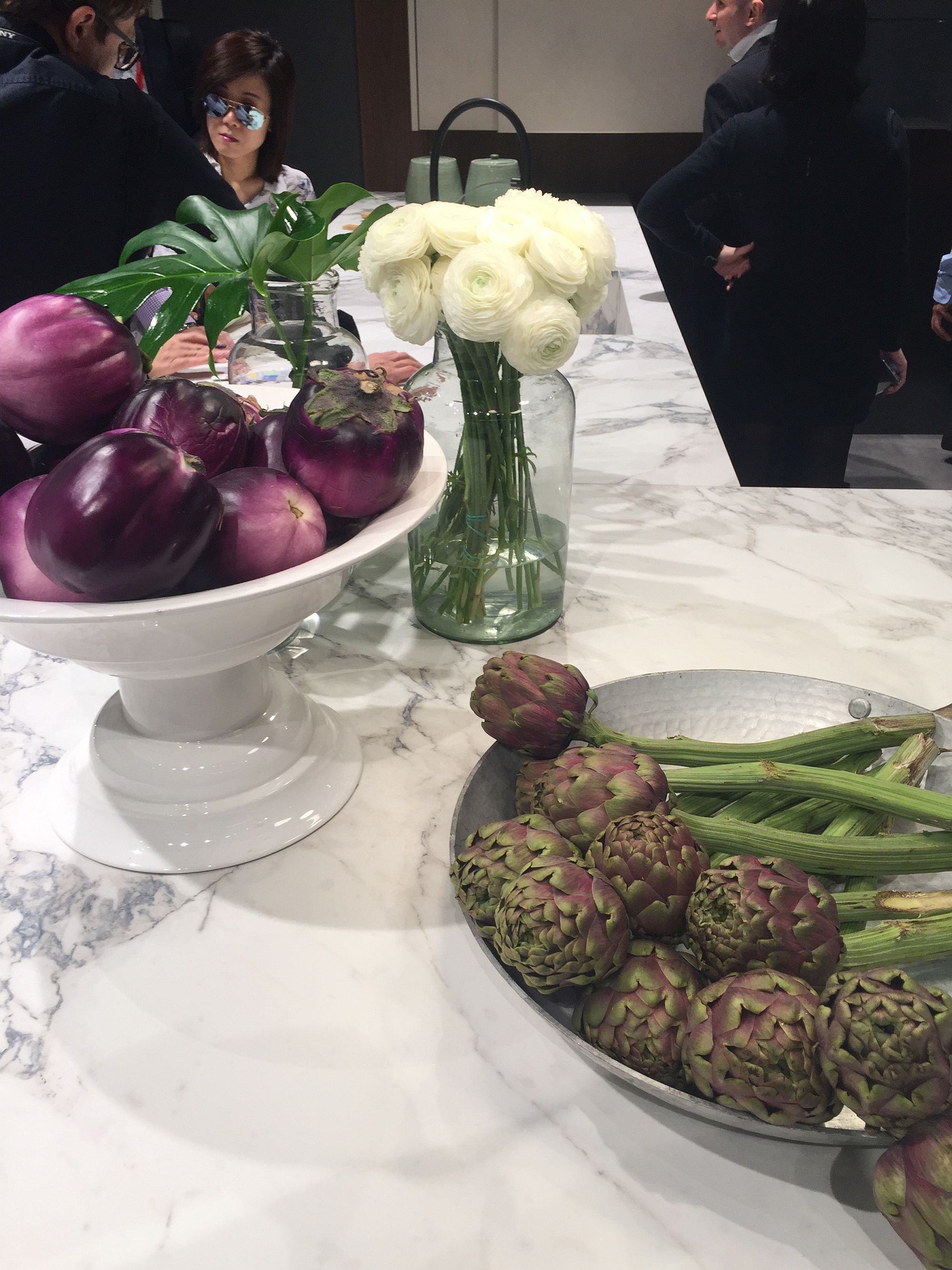 Decorating the marble kitchen island in style with seasonal flowers and much more