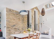 Existing-brick-walls-of-the-home-are-worked-into-the-overall-design-of-the-house-217x155