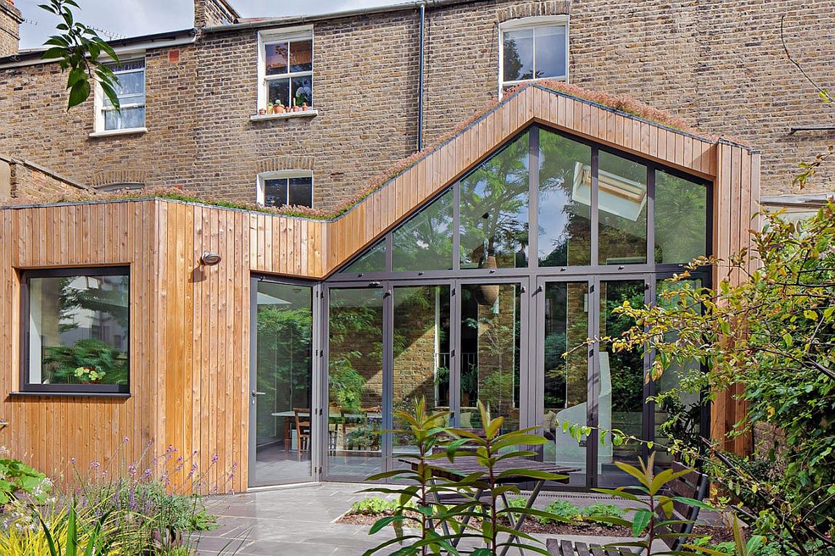 Folding doors connect the interior with the garden outside