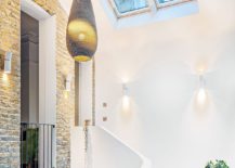 High-ceiling-of-the-modern-extension-gives-it-a-spacious-appeal-217x155
