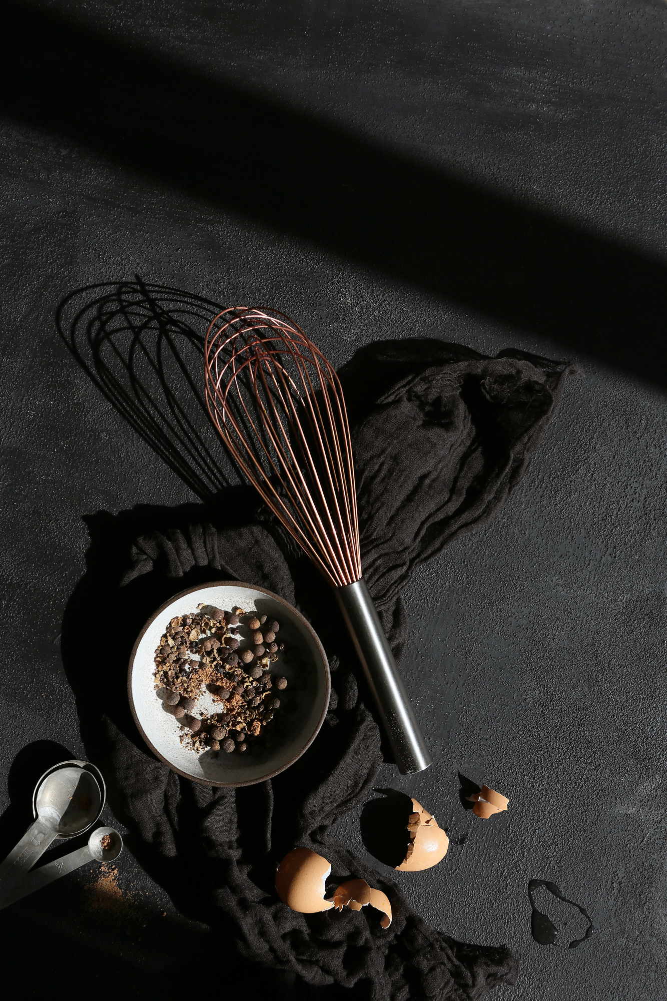 Holiday food prep against a black backdrop