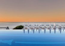 Infinity-edge-pool-that-overlooks-the-vast-Mediterranean-at-the-Grand-Hotel-du-Cap-Ferrat-217x155